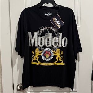 Modelo Black Tee with Gold and White Crest